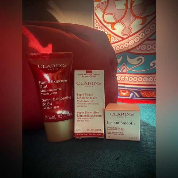 Clarins Vibrant Red Cosmetic Bag with Skincare Essentials - Picture 3 of 6
